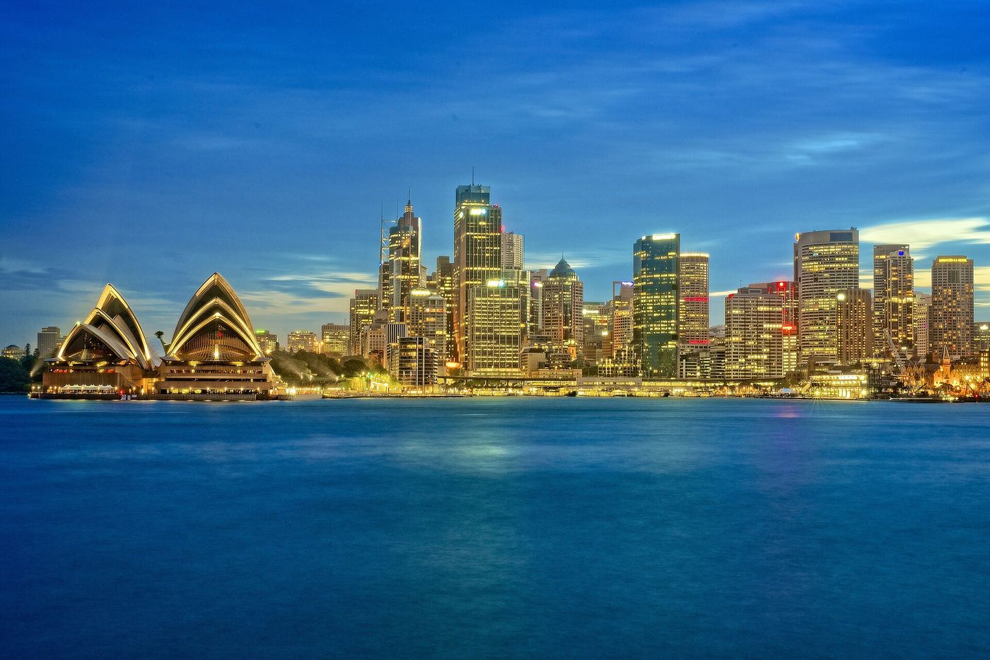 Sydney Opera House and city skyline at dusk